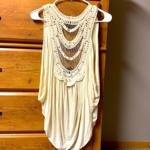 Cream vest with lace detailing on back